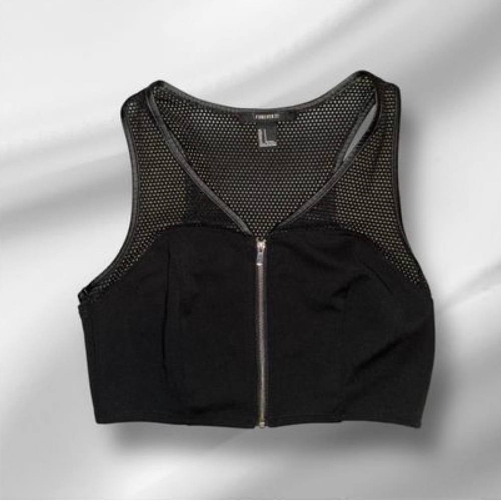 Woman’s black crop top.